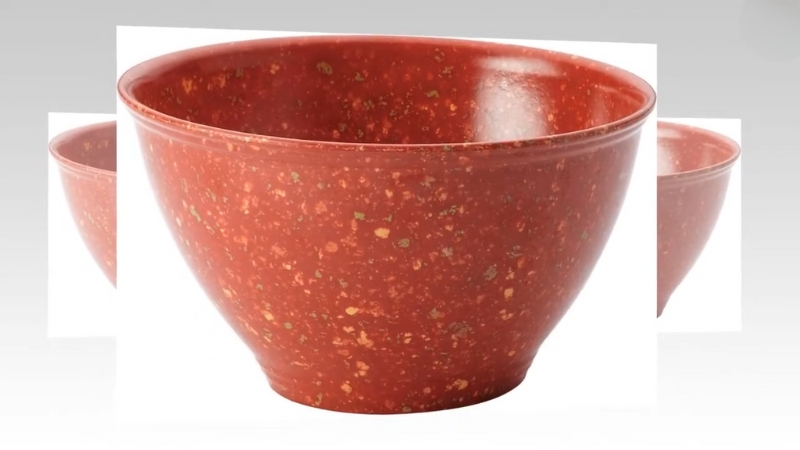 A red speckled kitchen bowl often used for Rachael Ray’s well-known garbage bowl cooking tip